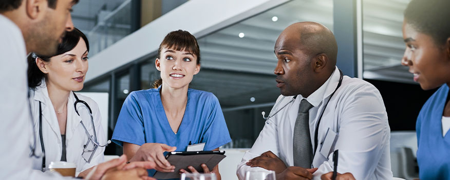 doctor and team reviewing system for adding new services to a medical practice