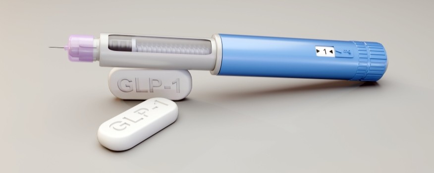 Doctor discussing GLP-1 therapy and medical weight loss implementation with patient in a modern healthcare practice