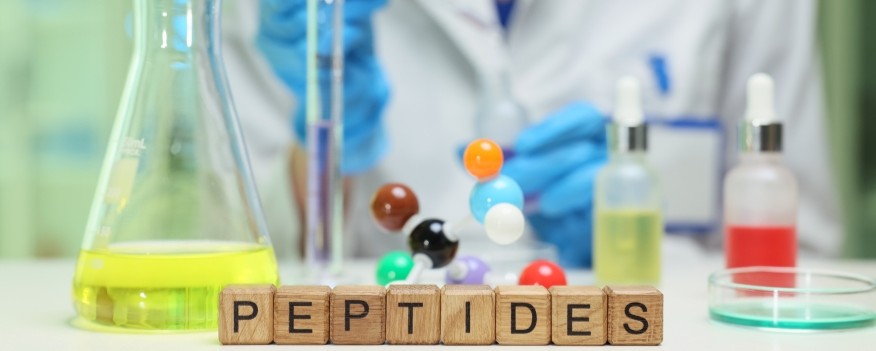 Doctor and clinic staff reviewing peptide-based weight loss program systems and training on the RPS platform